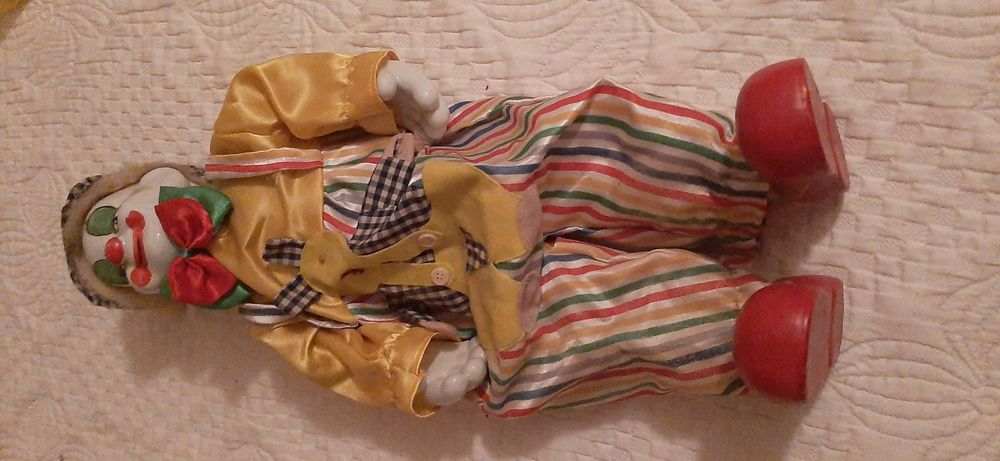 Vintage clown with porcelain face and limbs64737892788481123
