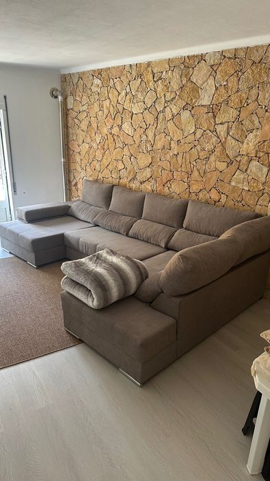 Sofá com chaise long e cama