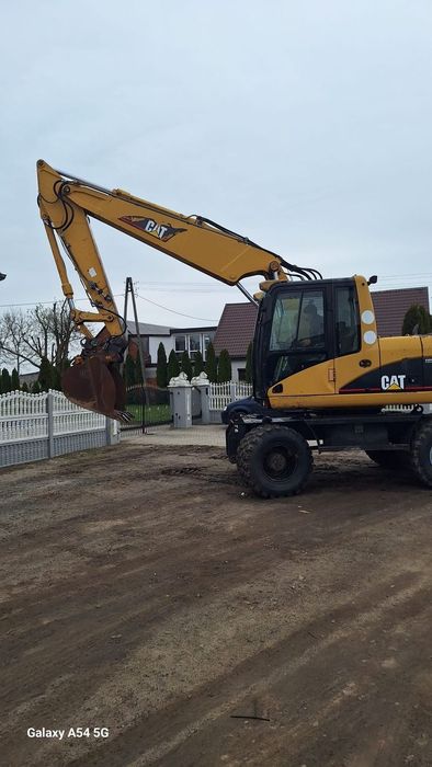 Caterpillar M 315C  Koparka kołowa CAT M 315 C. 3 x łamana, cena  89900 oryginał brutto