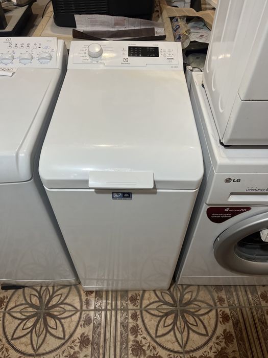 Продам бу стиральную машину Whirlpool с вертикальной загрузкой