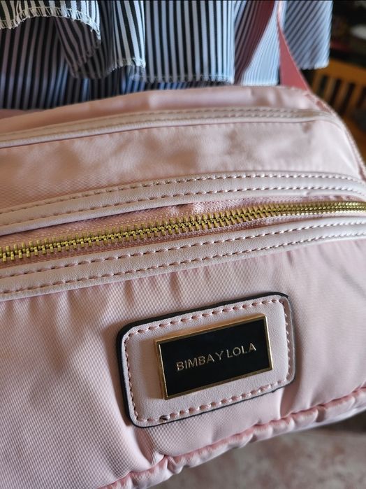 Mala tiracolo rosa bebé nova