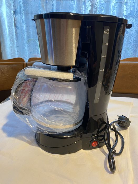 Продам кофеварку новую