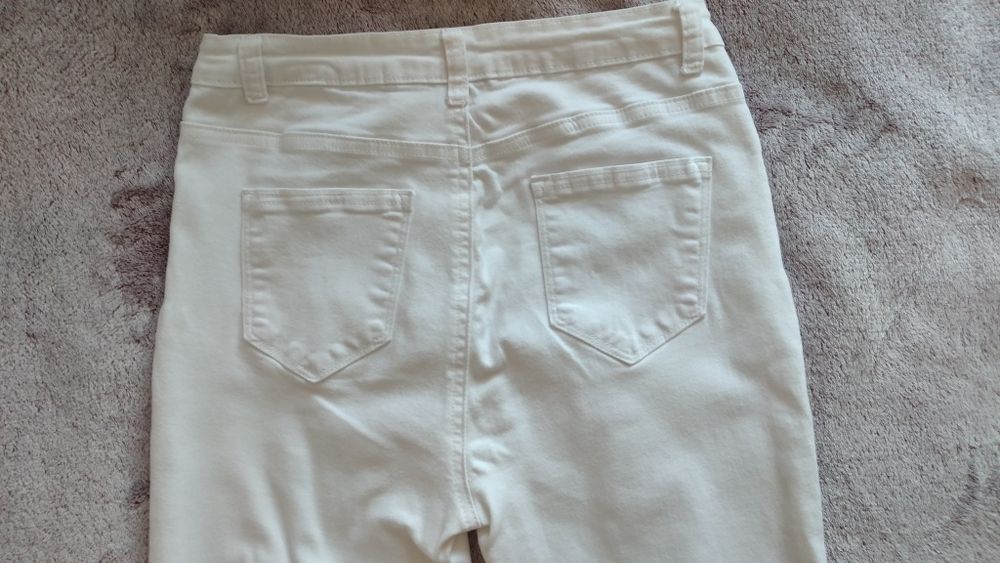 Biale spodnie skinny damskie rozm M
