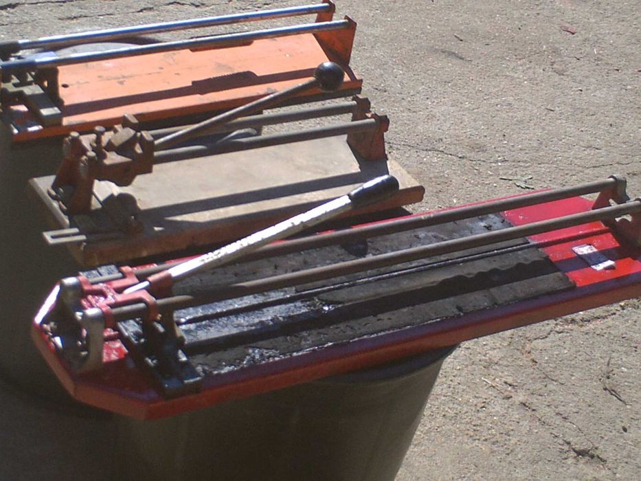 tres maquinas de cortar ceramica, grande\media \pequena