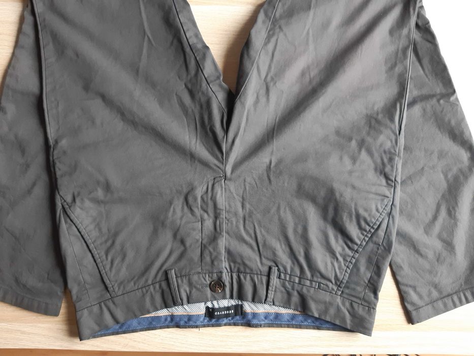 Spodnie chinosy chino materiałowe Reserved