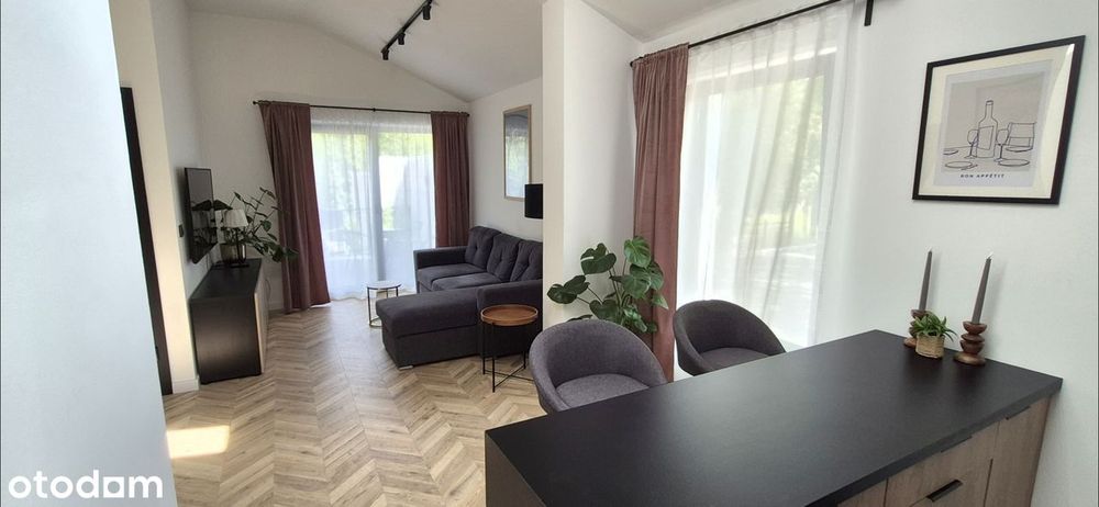 WYJĄTKOWY APARTAMENT z ogródkiem i przestronnym tarasem.