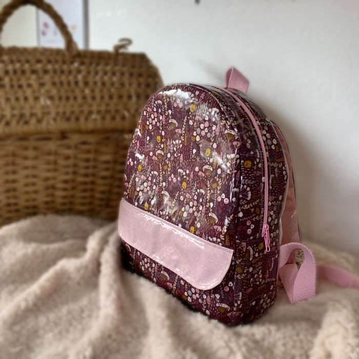 Mochila plastificada para criança64284035338626121