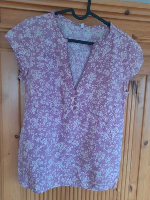 A blusa está em bom estado.