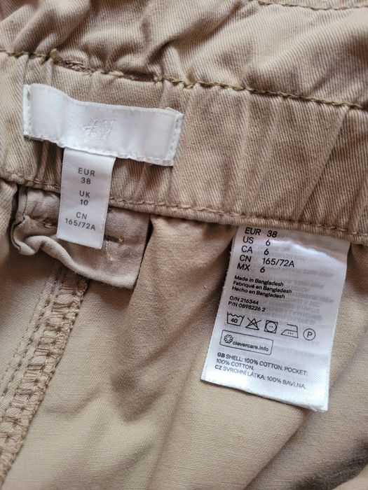 Вкорочені бежеві штани H&M