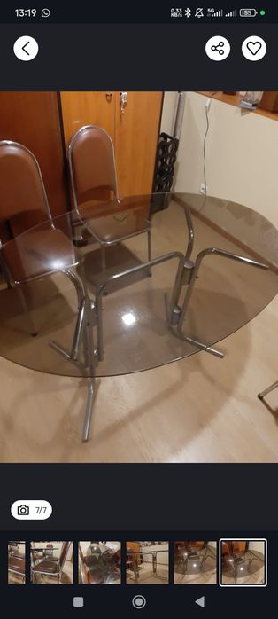 Mesa de vidro oval e 6 cadeiras