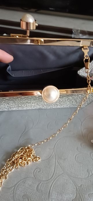 Srebrna elegancka kopertówka