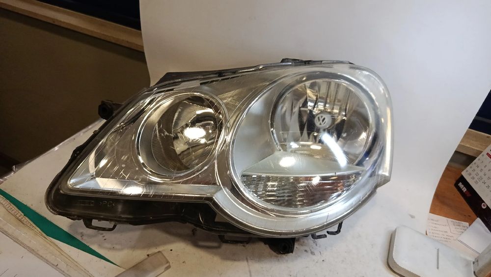 Ótica / farol esquerda VOLKSWAGEN Polo (9N)
