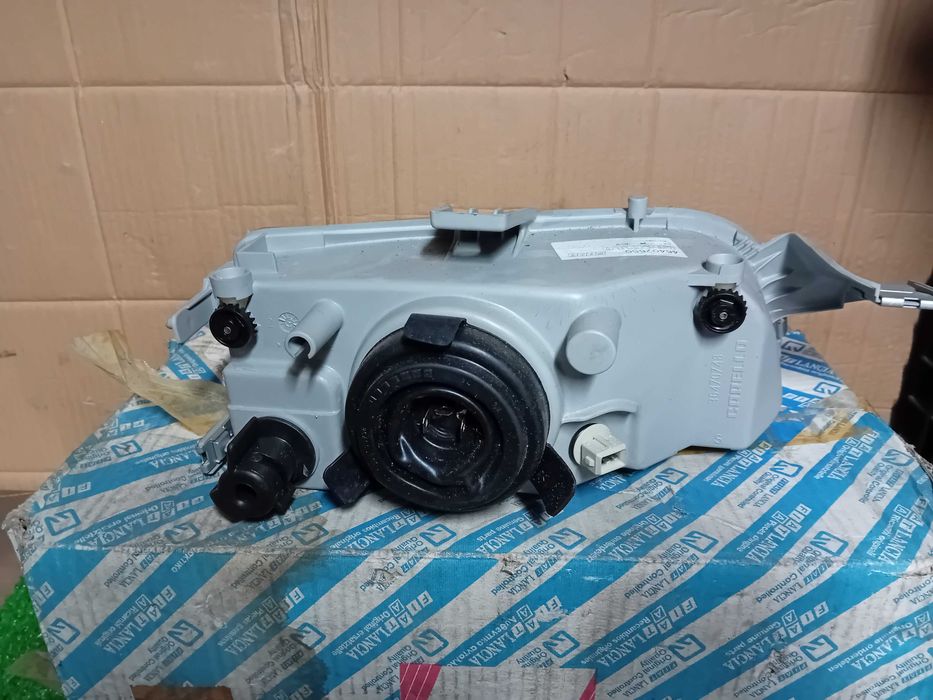 farol esq fiat punto mk1 novo original