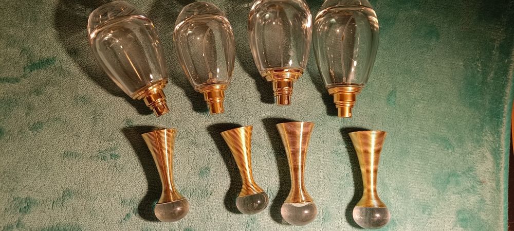 Puste flakony kolekcjonerskie Jadore z różnych lat