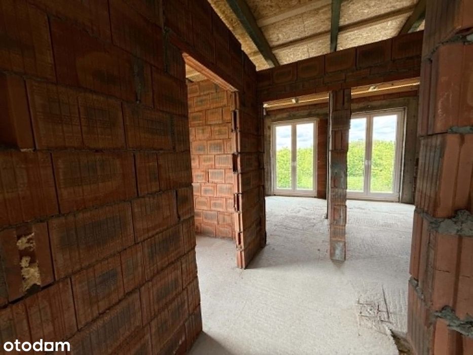 Nowoczesny dom w zabudowie bliźniaczej – 167 m² z garażem i poddaszem.