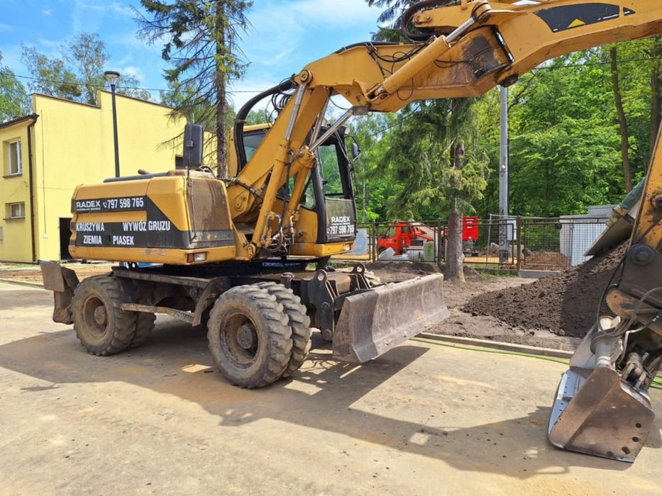 Cat M312 koparka kołowa