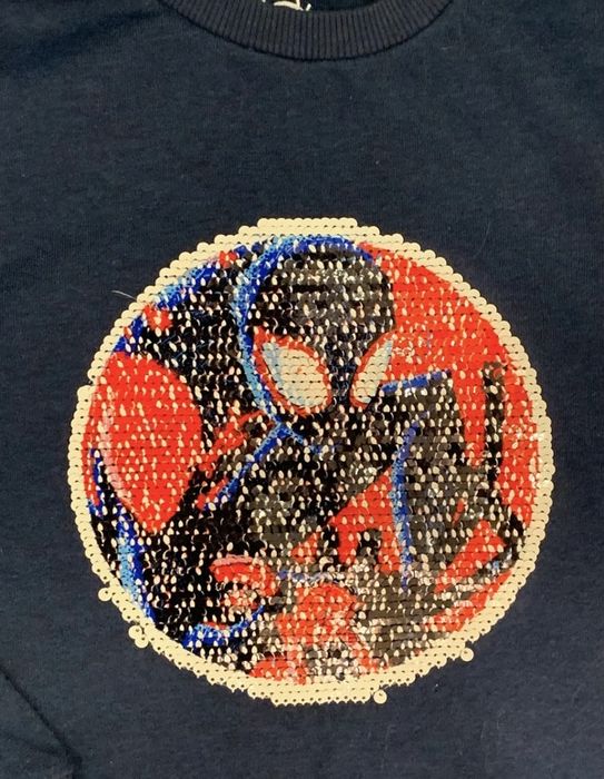 Granatowa bluza chłopięca cekiny Spiderman C&A 128/134
