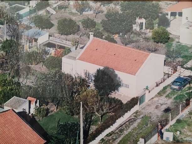 Terreno com Moradia