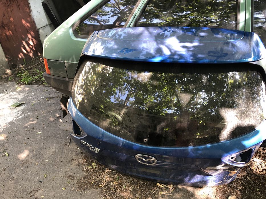 Мазда сх 5 заднее стекло