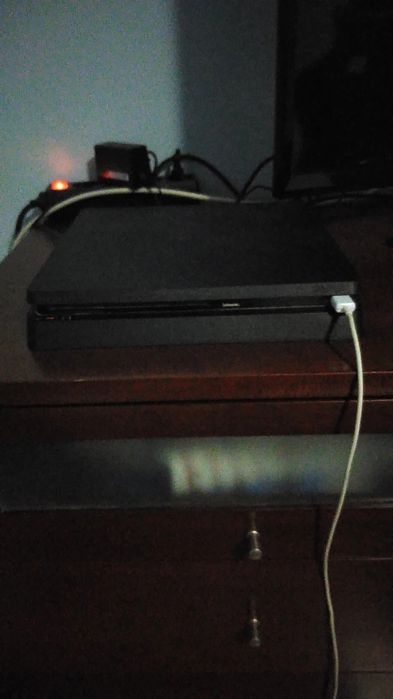 PS4 Slim 1 TB, like new, no risk whatsoever, and fully functional64563977547394120