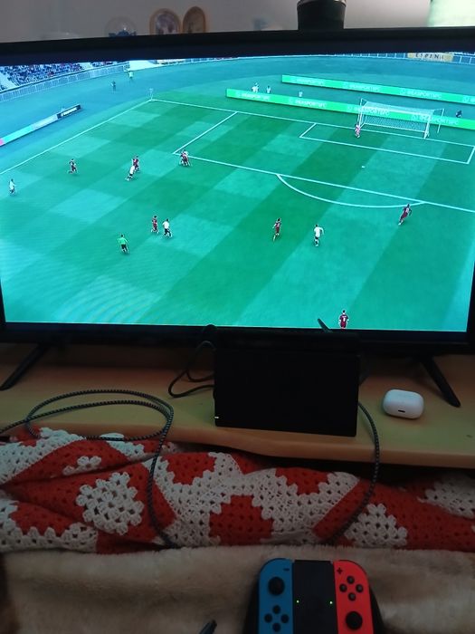 Nintendo switch + FC 26 e respetivos acompanhamentos