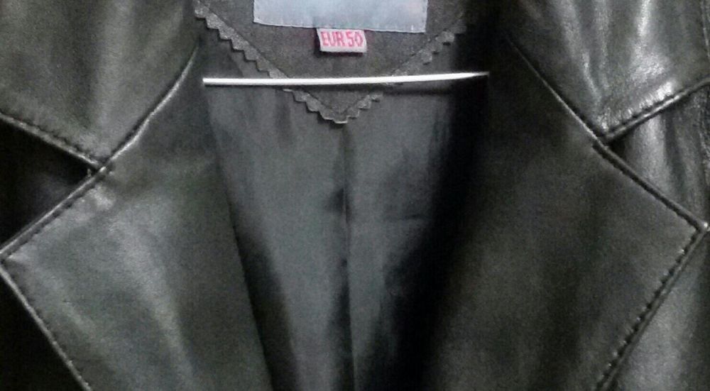 casaco em couro . Nova