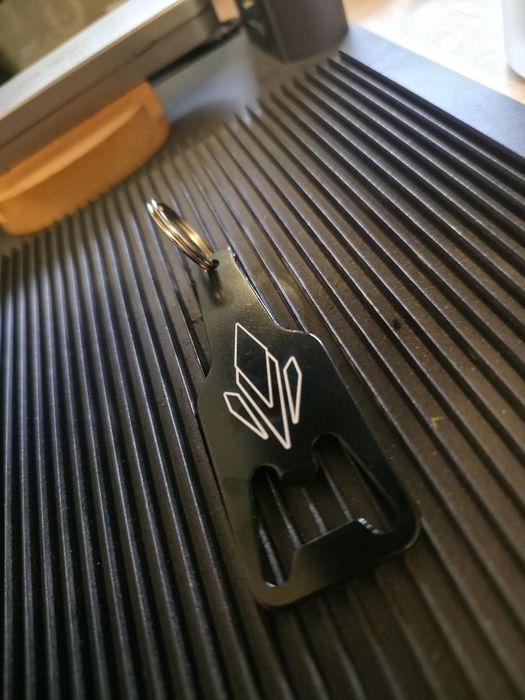 Porta-chaves Abre-cápsulas personalizado