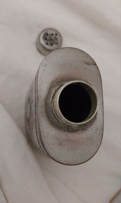 Frasco de pó de talco antigo