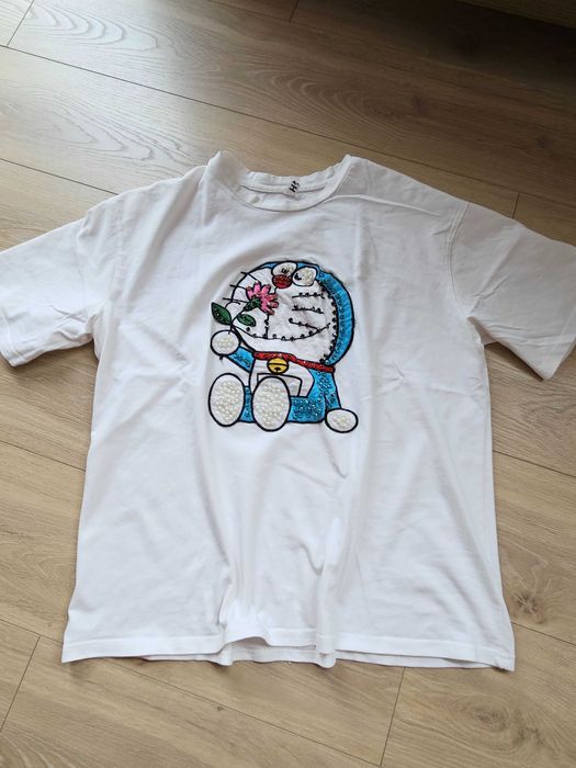 Biała koszulka z bogatą aplikacją roz. XL