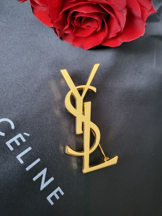 Broszka ysl złota