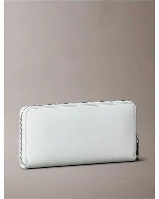 Новый кошелек calvin klein (ck sculpted impresion zip wallet)с америки