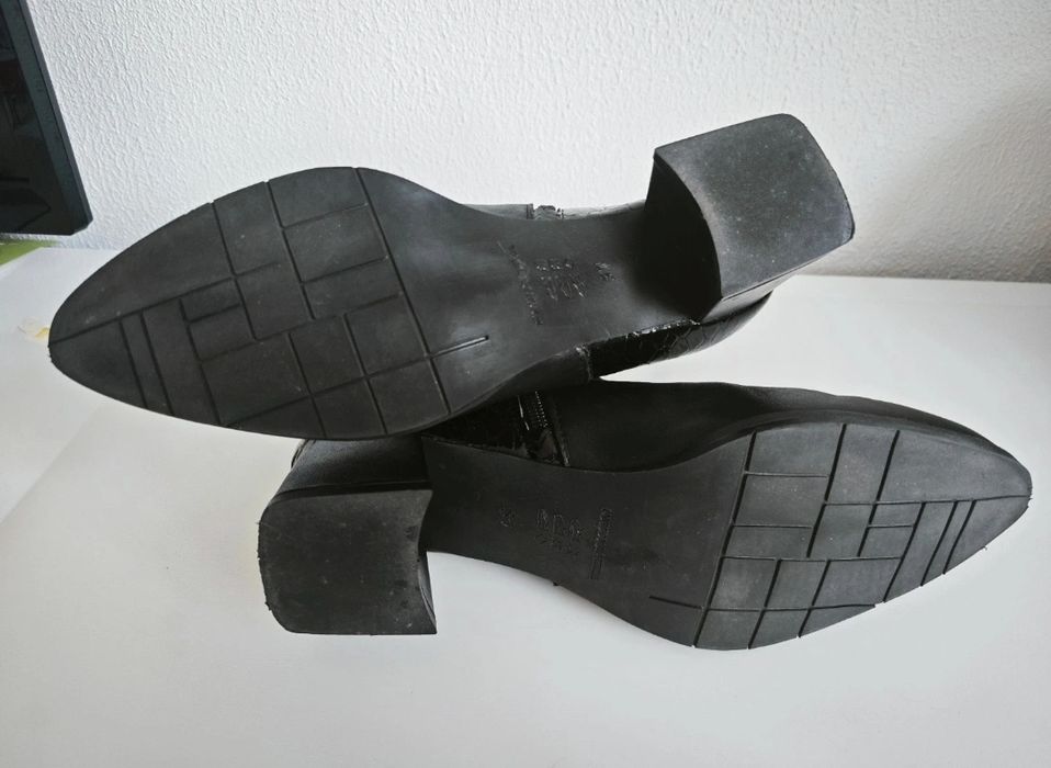 Botas de pele pretas da Seaside