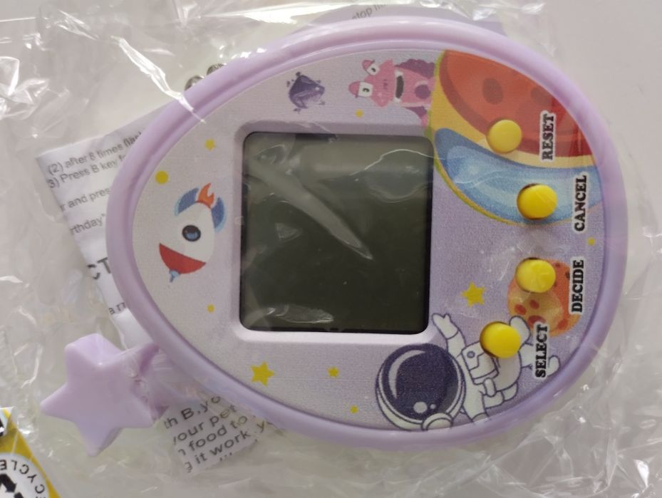 Nowe tamagotchi interaktywne zwierzątko space kosmos fiolet