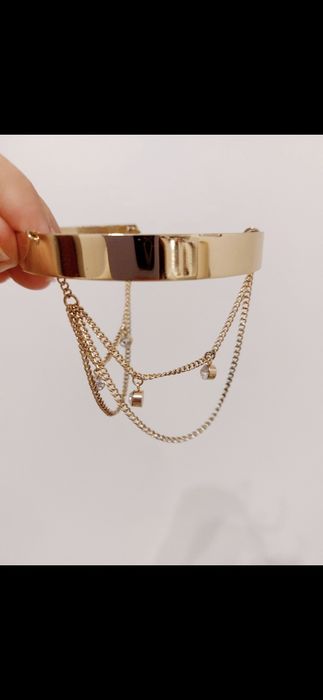 Pulseira para o braço dourada