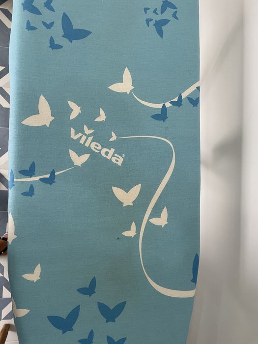 Ferro e tabua de passar