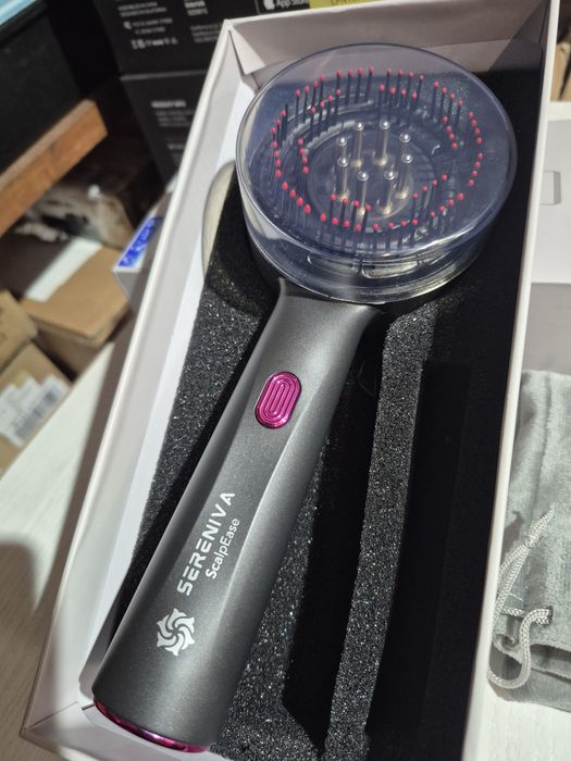 Масажер - гребінець для волосся .