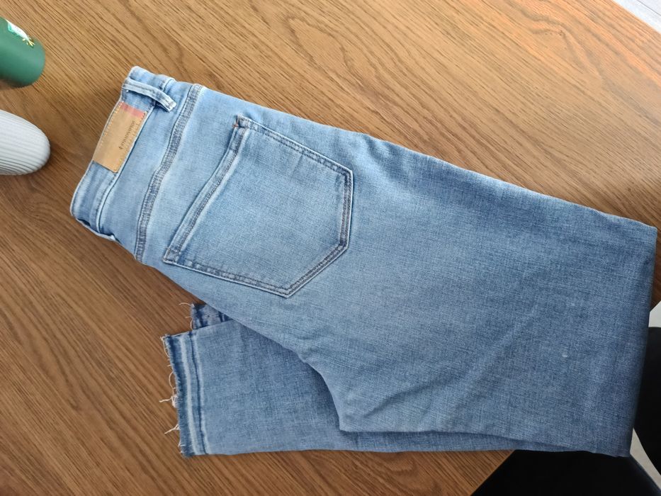 Spodnie damskie dżinsy Stradivarius 42