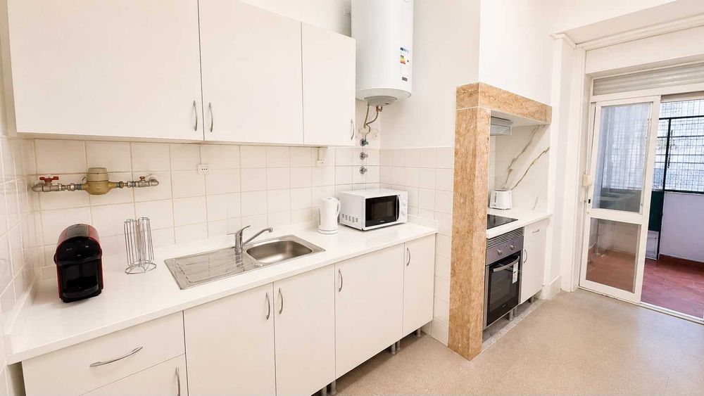 Quarto no coração de Arroios
