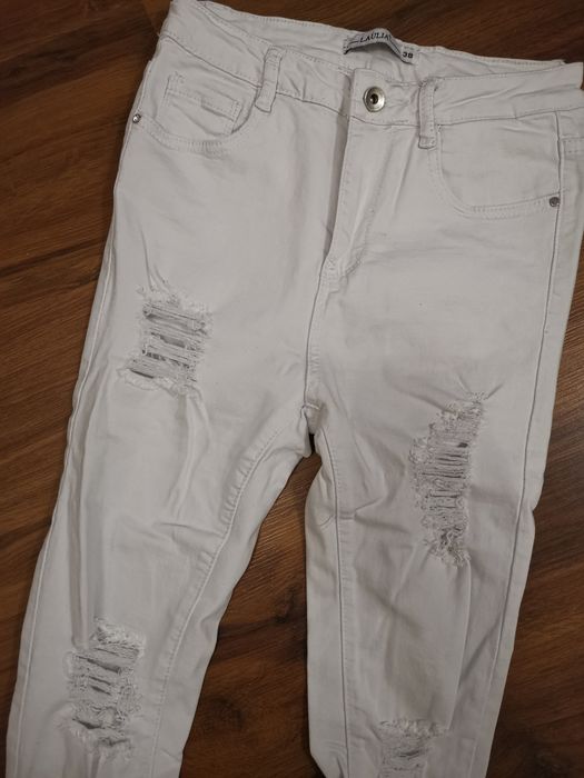 Białe rurki jeans dziury M (38)