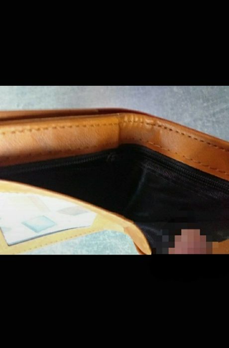 Brązowy portfel męski 100$