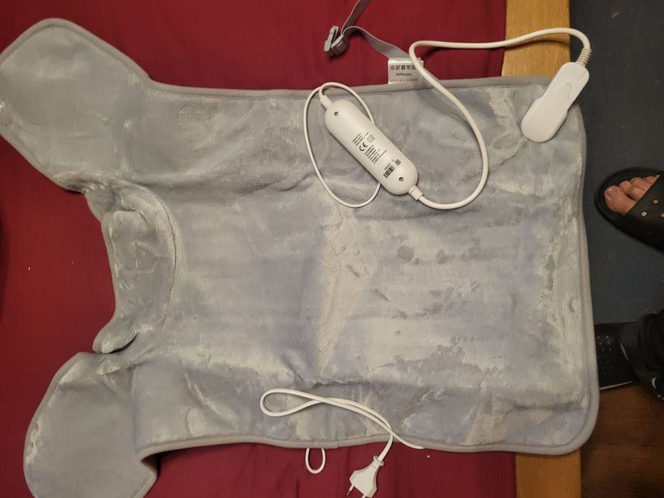 Sprzedam  narzutkę na plecy z elektrycznym ogrzewaniem.