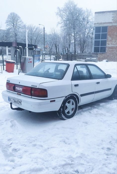 Мазда 323 mazda газ