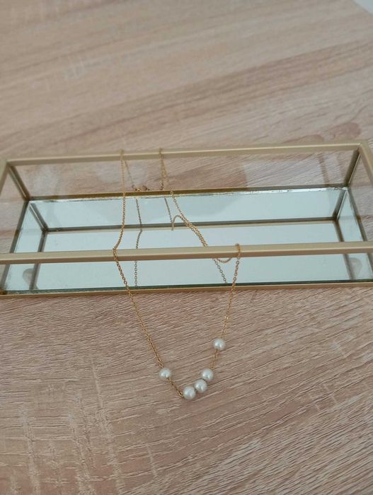 Fio Dourado em Aço com Pérolas