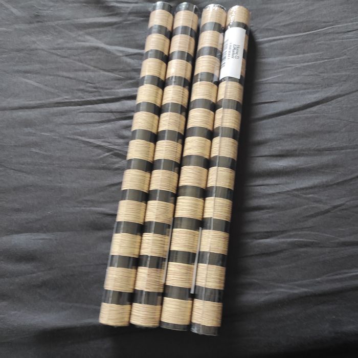 Quatro rolos de papel autocolante