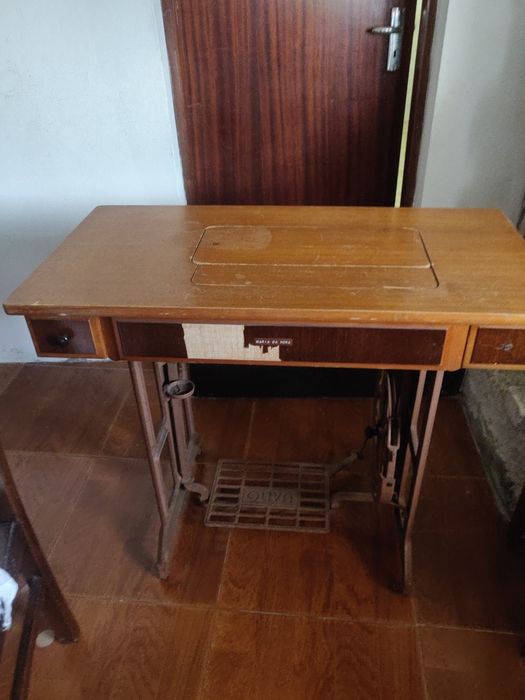 Máquina costura oliva