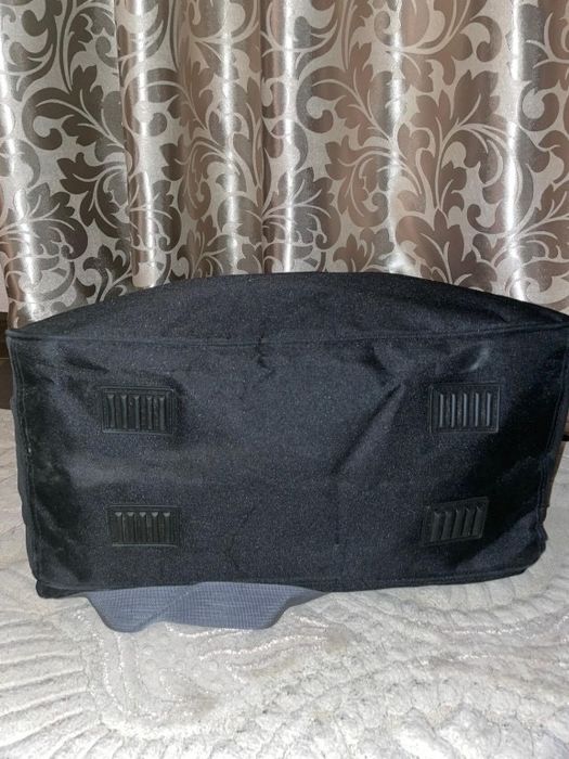 Дорожня вмістка сумка