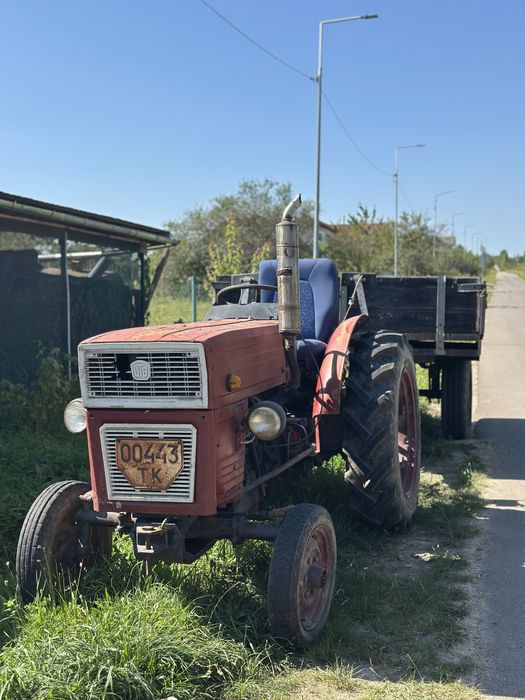 Трактор універсал 445 , причеп , косарка роторна z-069