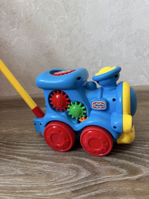 Потяг на палці, іграшка каталка