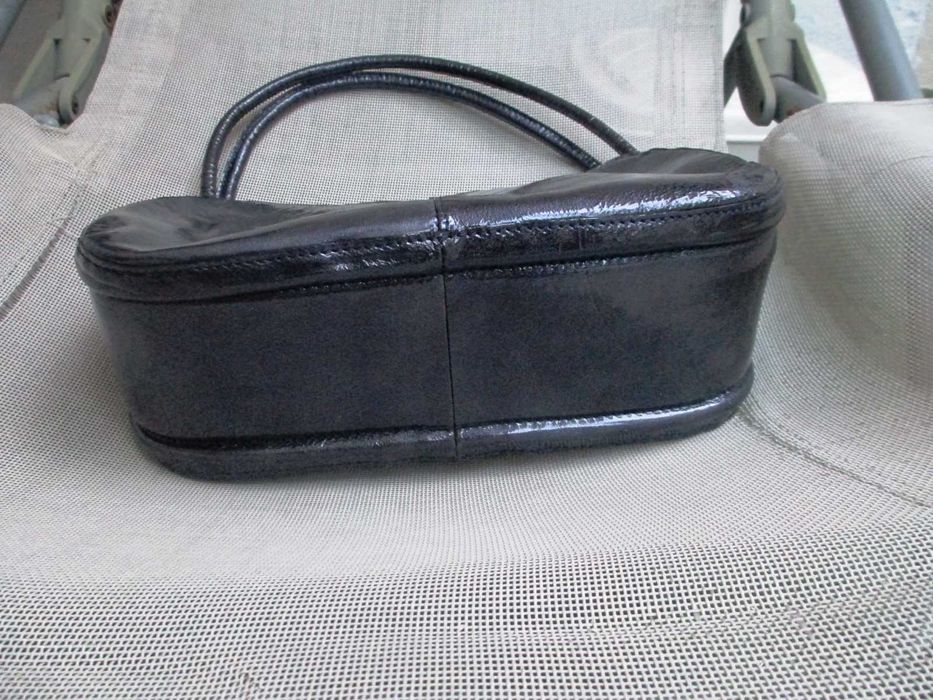 Mala Acosta de verniz