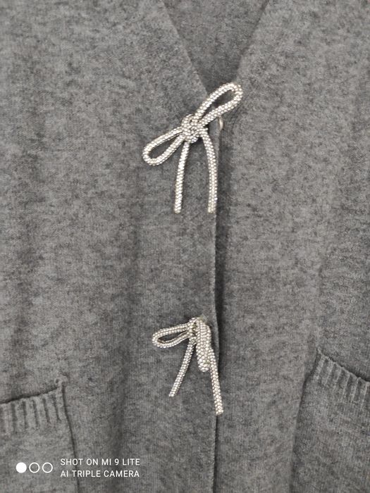 Casaco de malha cinza